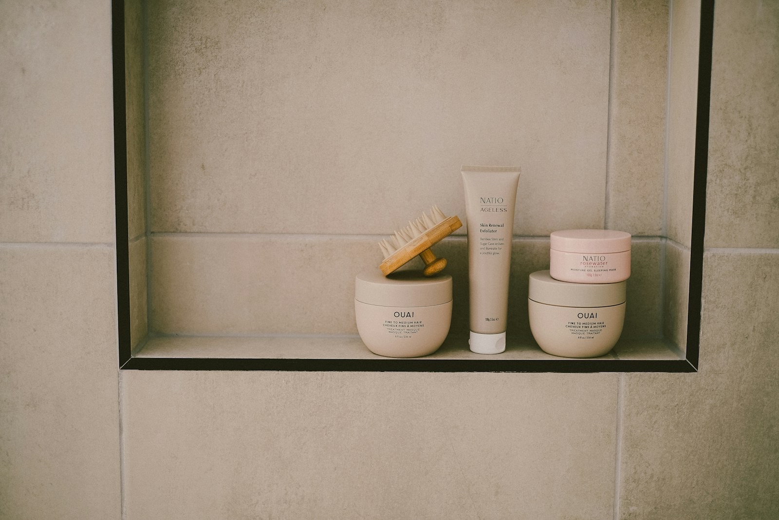 Cosmetics arranged neatly on a shelf