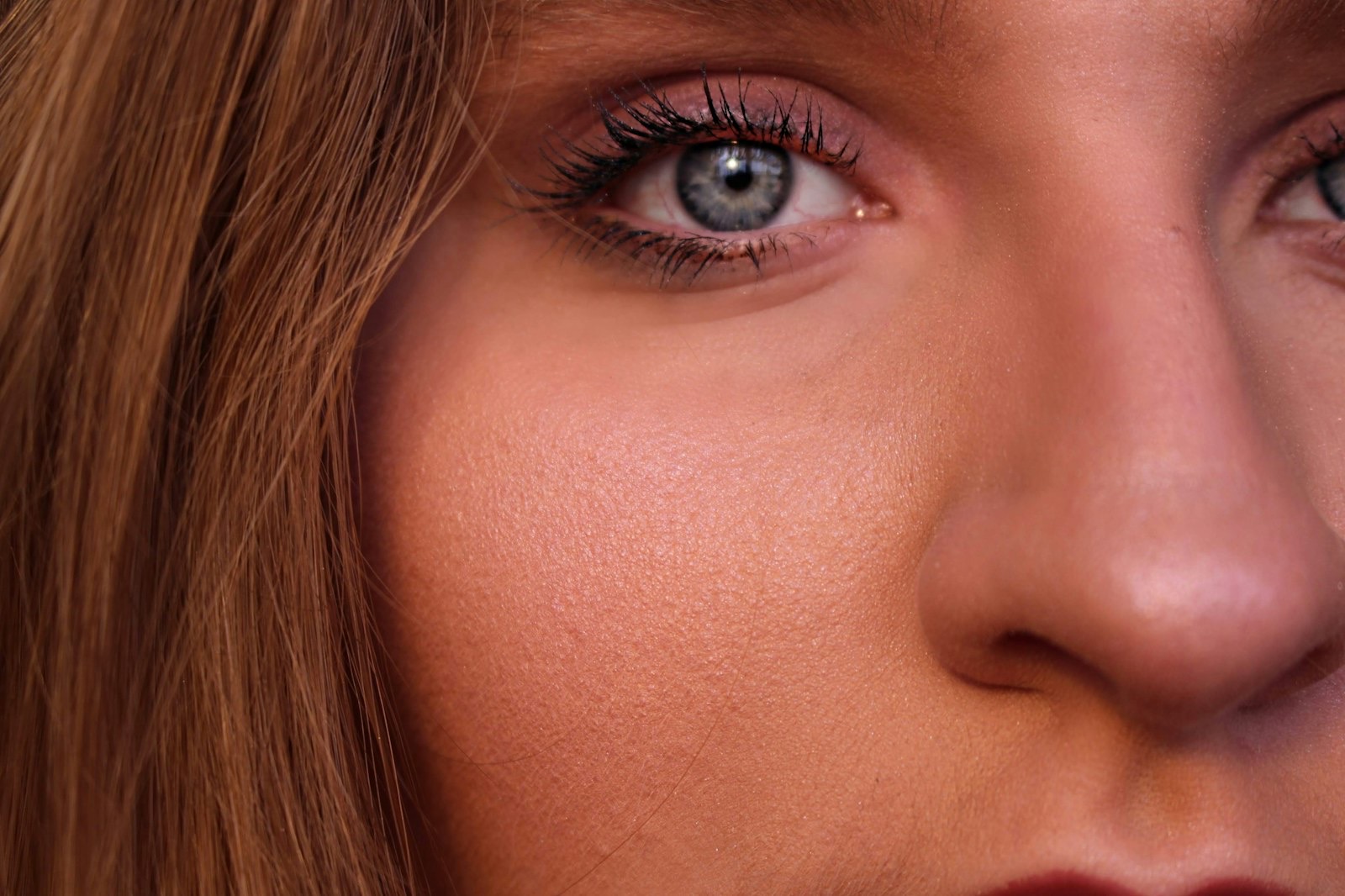 Close-up portrait showing skin texture and tone