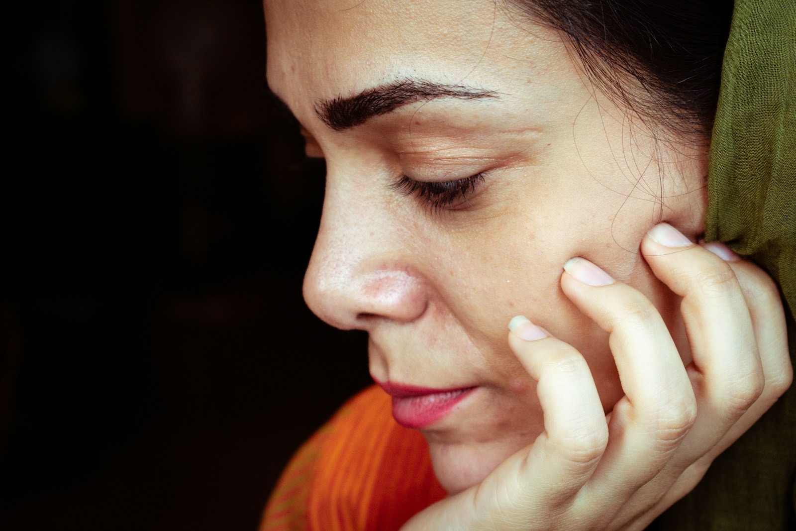 A woman in soft light, profile view